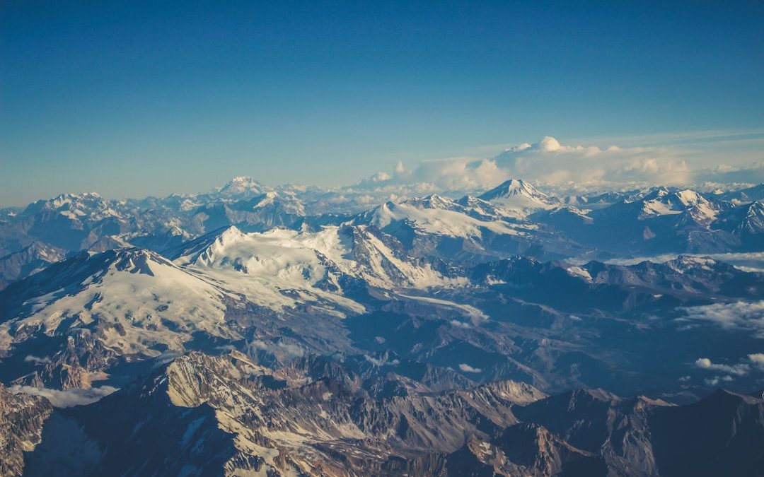 aerial photography of snow-capped mountain range during daytime