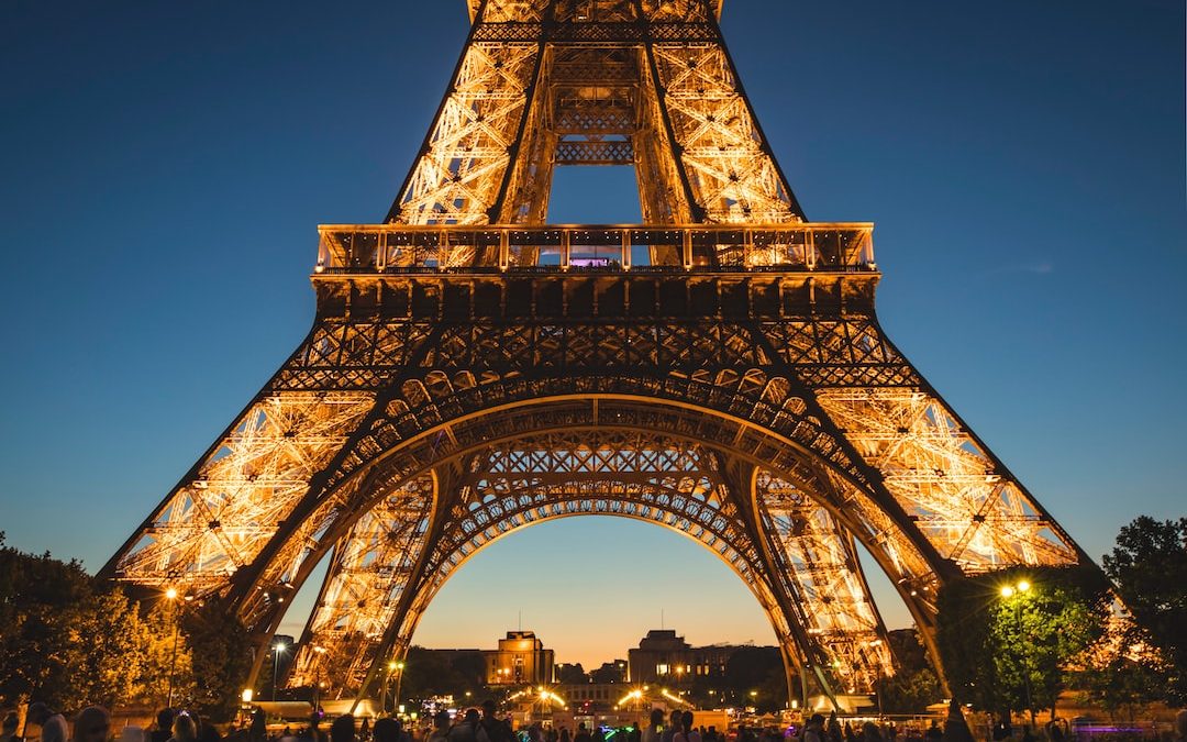 low angle of Eiffel Tower, Paris under blue sky