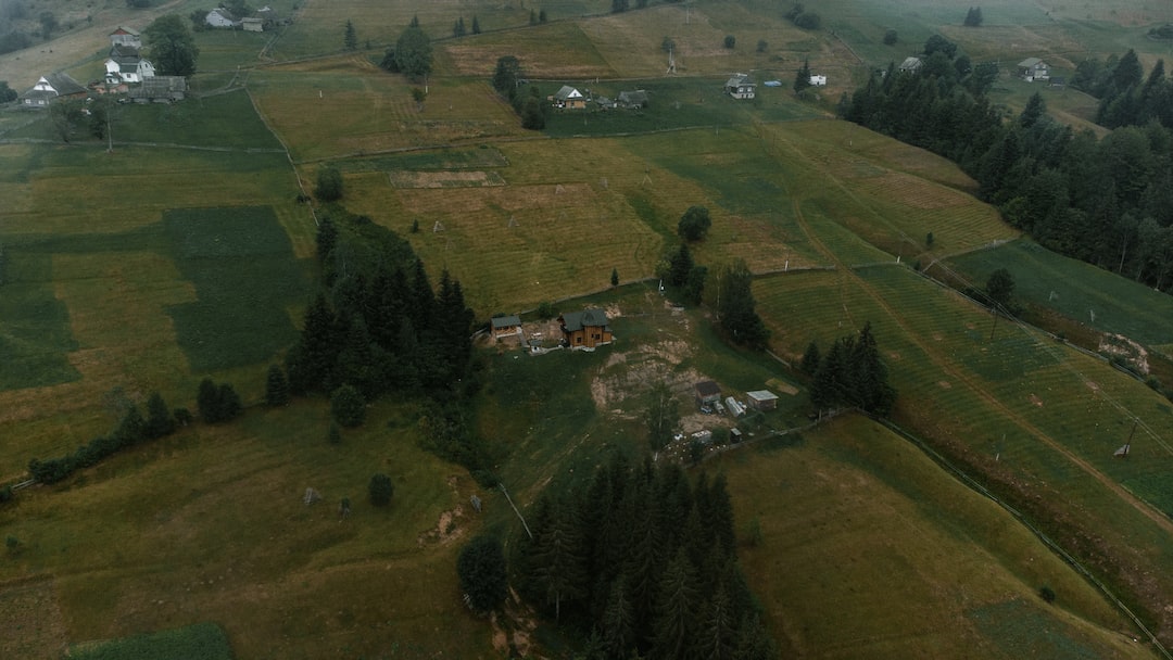 a landscape with houses and trees