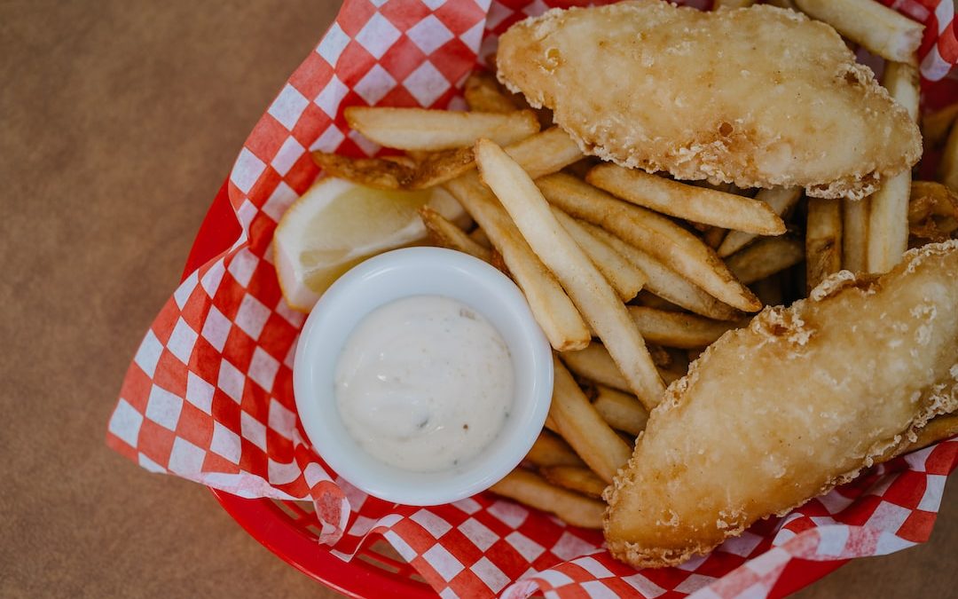 fried food on red and white checkered plate