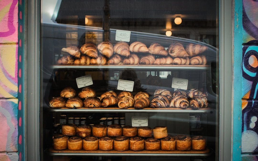 baked pastries and breads on display counter