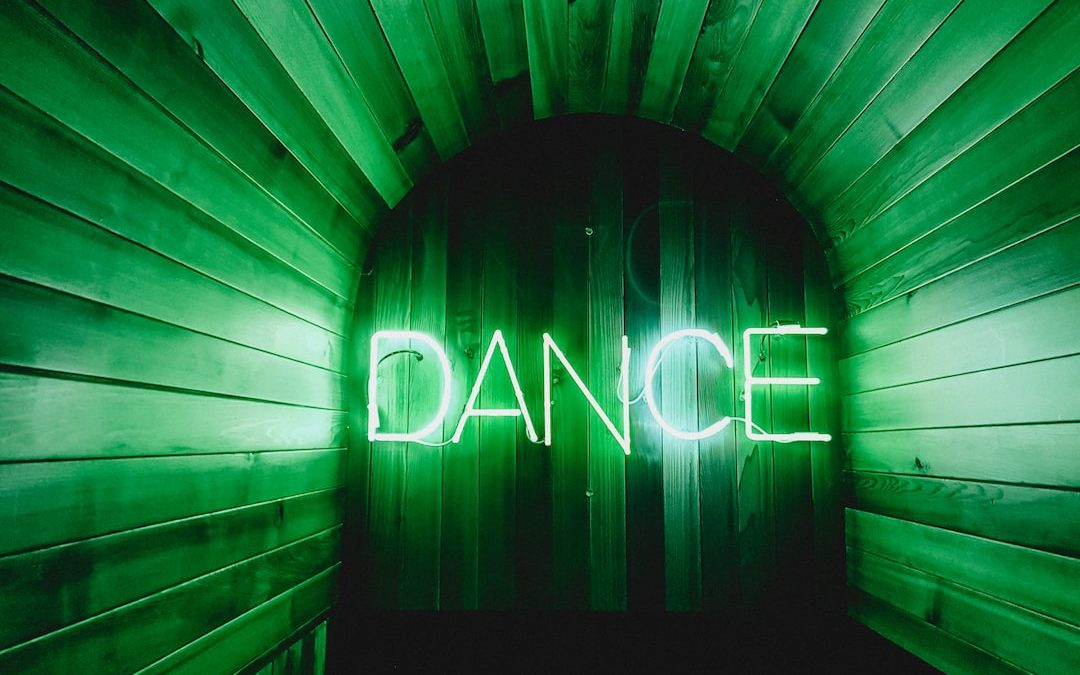 brown door with Dance neon lights