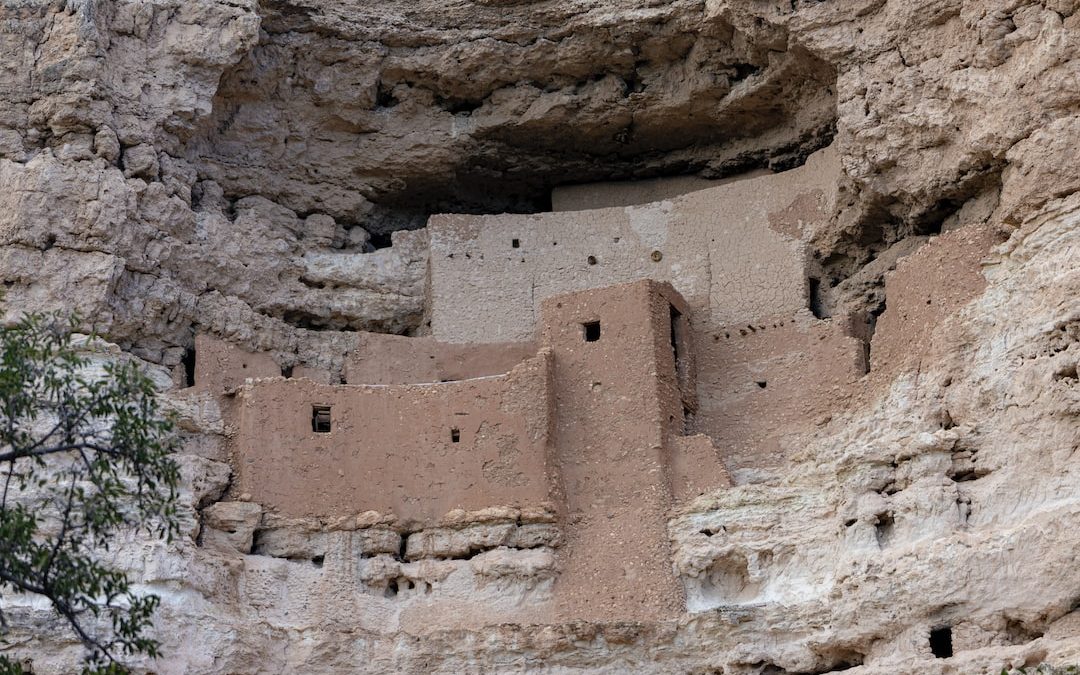 a cliff dwelling built into the side of a mountain