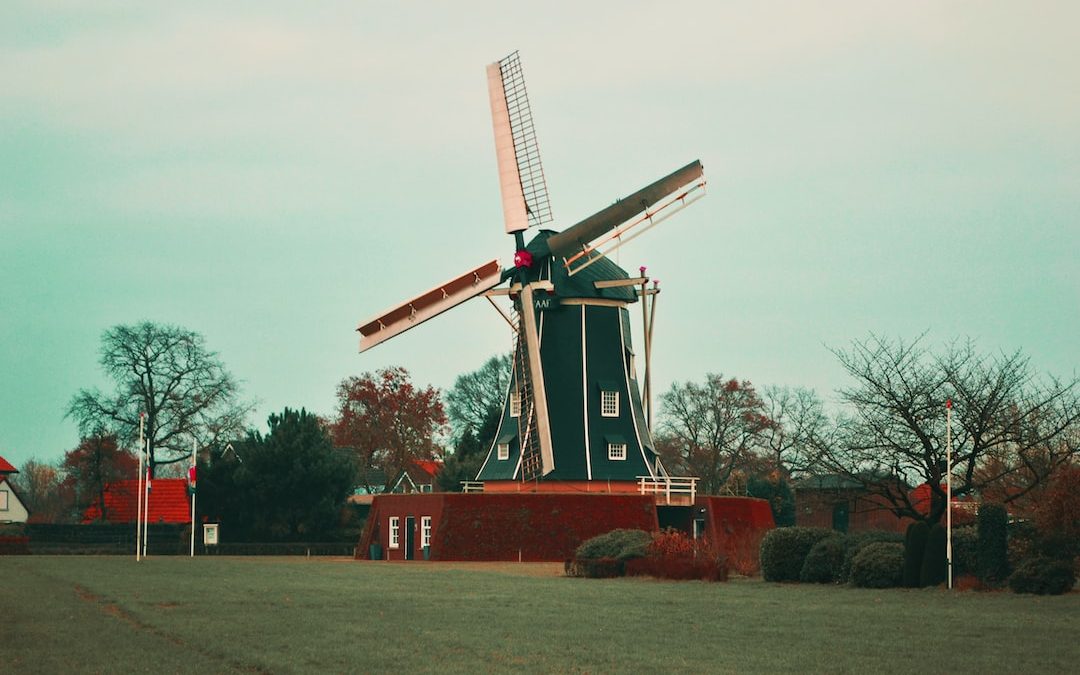 photo of brown and green windmill