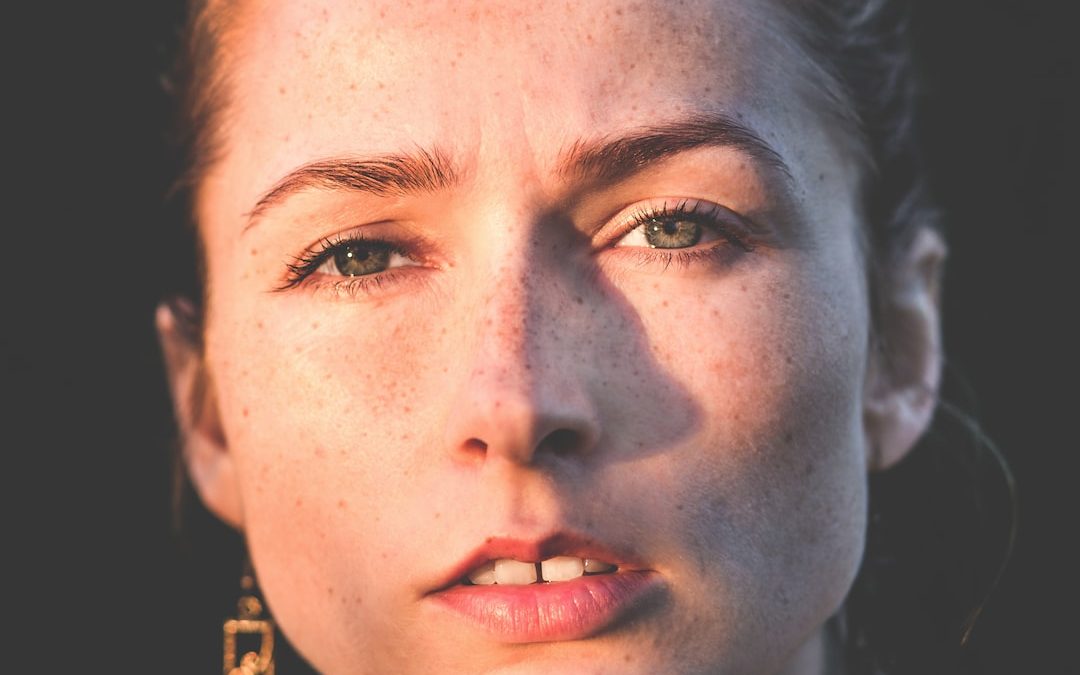 sun rays of woman's face