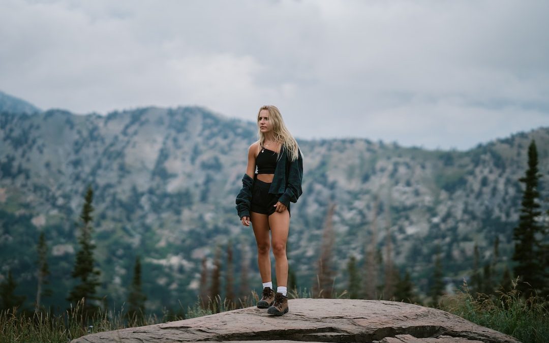 a person standing on a rock