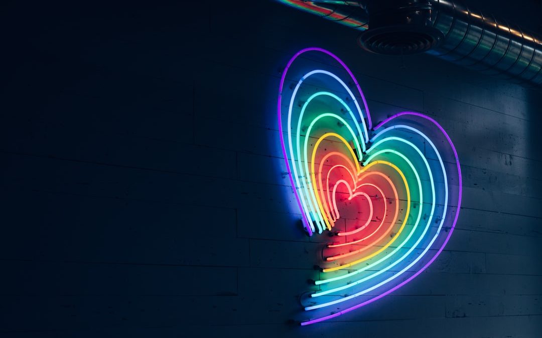 multicolored heart LED light on wall