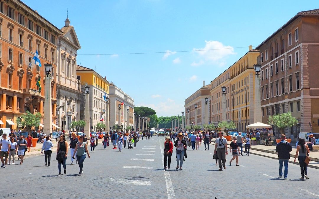 a group of people walking in Ravenna