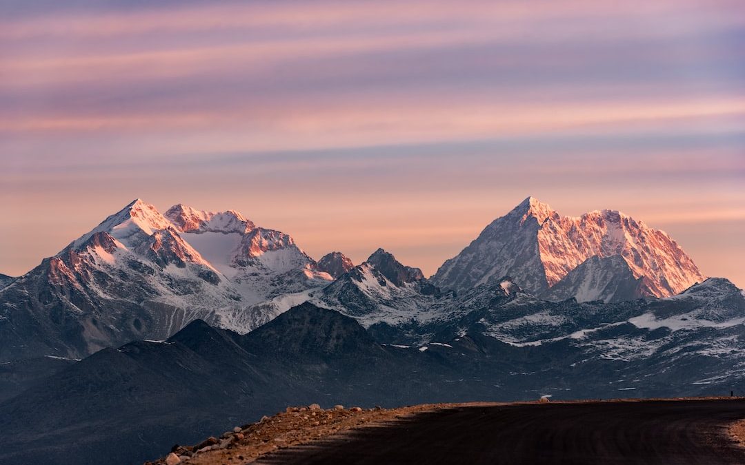 snow covered mountain during daytime