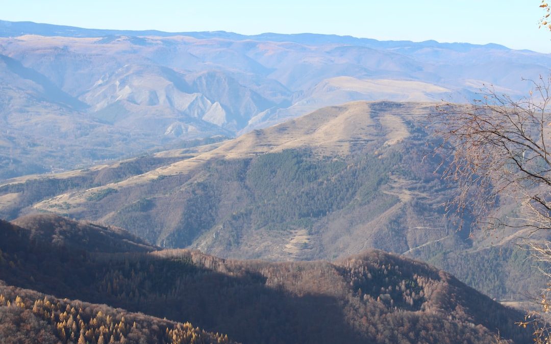 a view of a mountain range from a distance