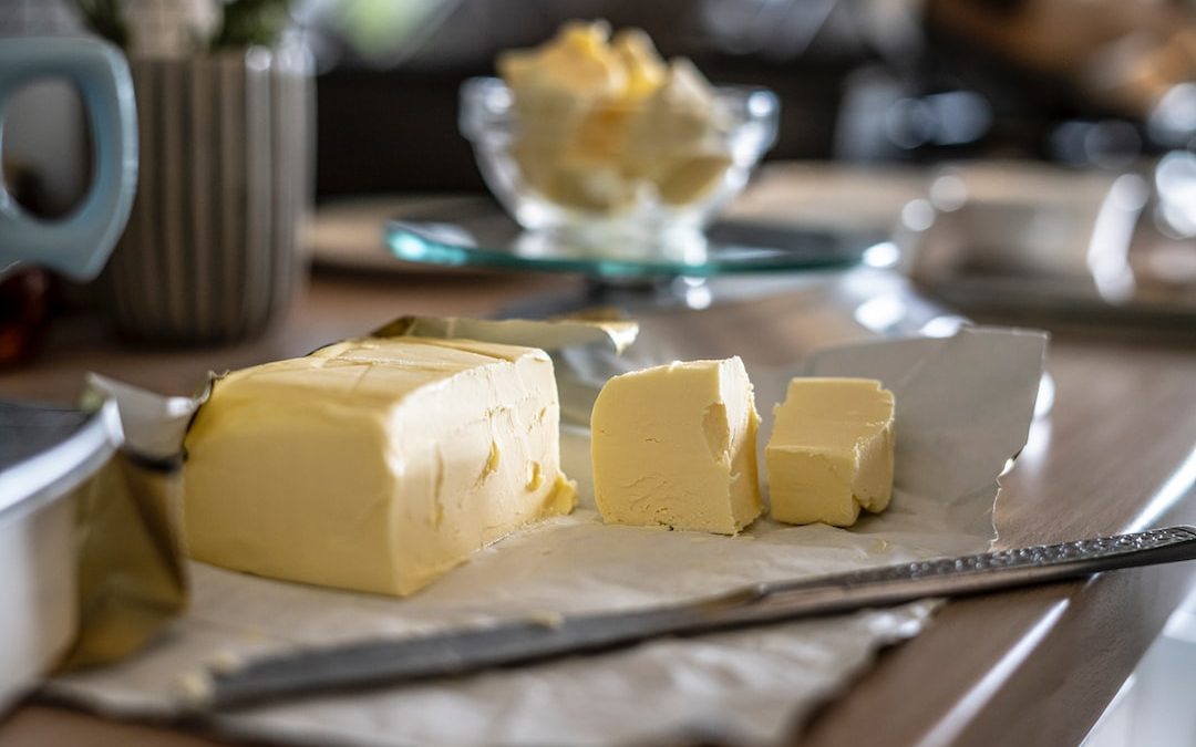 sliced cheese on clear glass plate