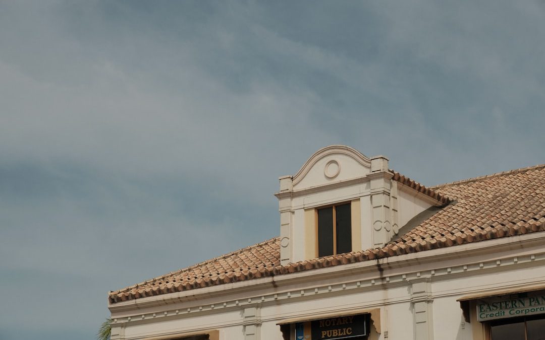 a building with a clock on the top of it