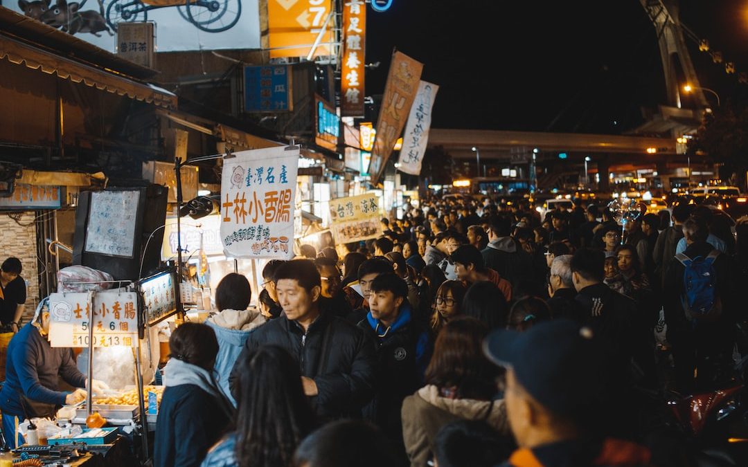 group of people infront of store