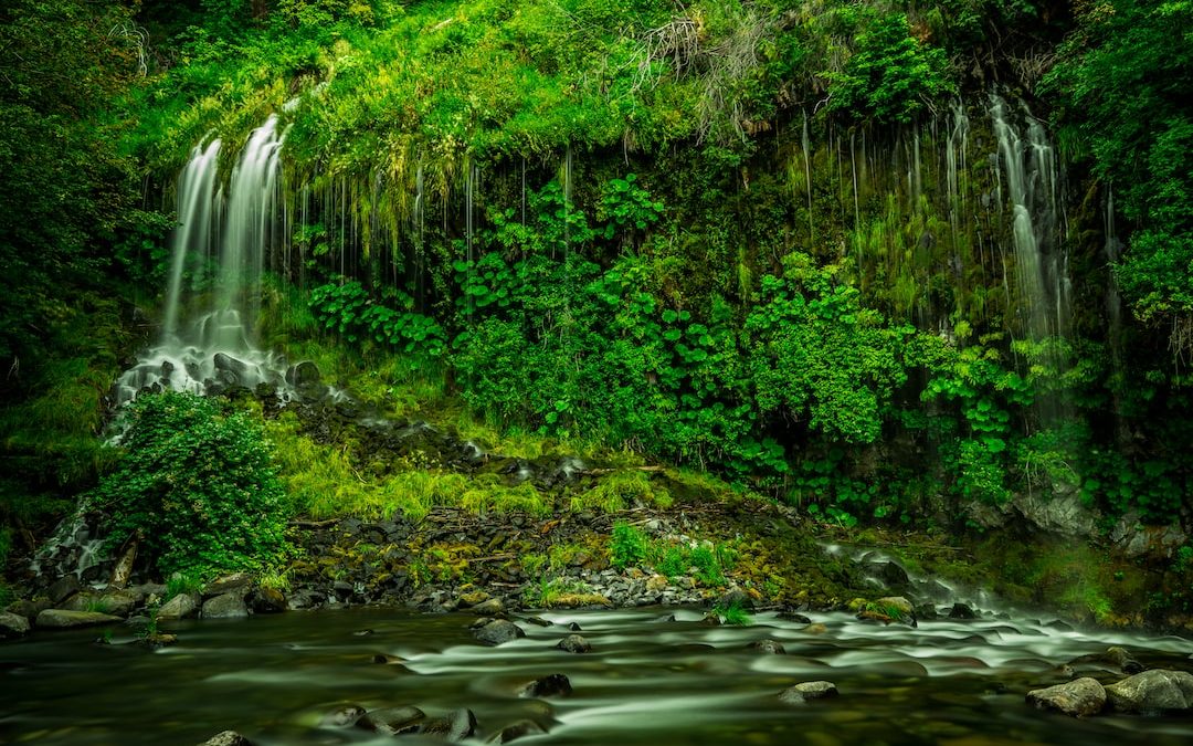 time lapse photography of multi-step waterfalls