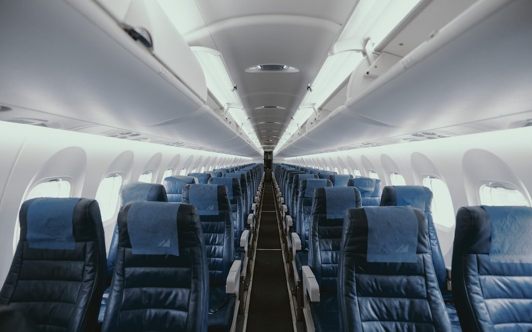 blue airplane interior with seats