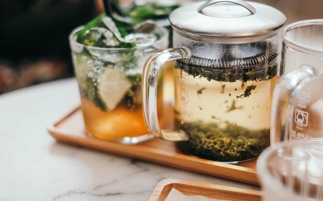 clear glass mug on tray