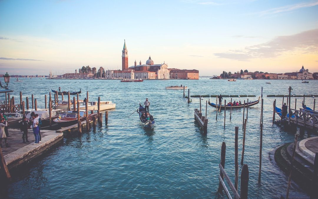 photography of of people near boat during daytime