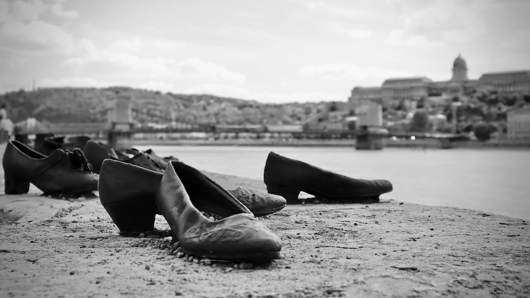 a pair of shoes on a beach