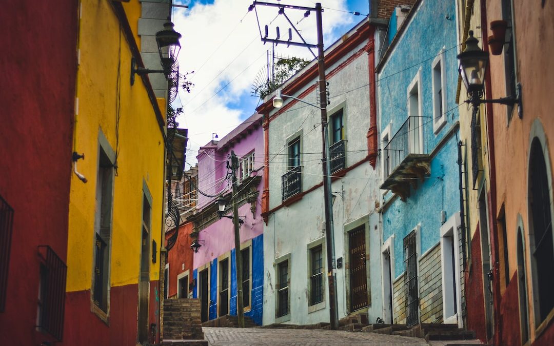 assorted-color houses at daytime