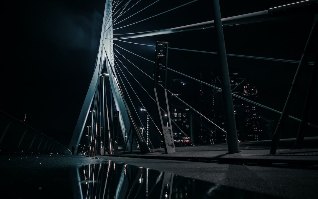 grayscale photo of a bridge