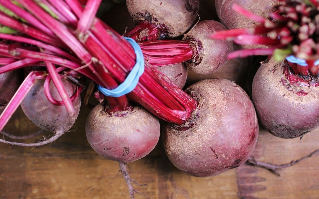 turnips on brown wooden surface