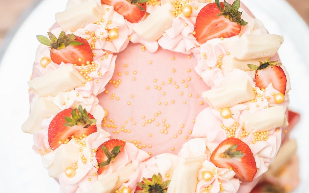 a cake with strawberries on top of it