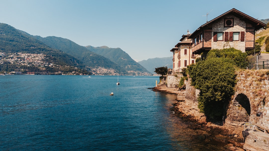 a building on a cliff over a body of water