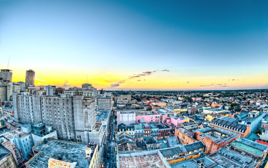 aerial photography of city buildings during yellow sunset