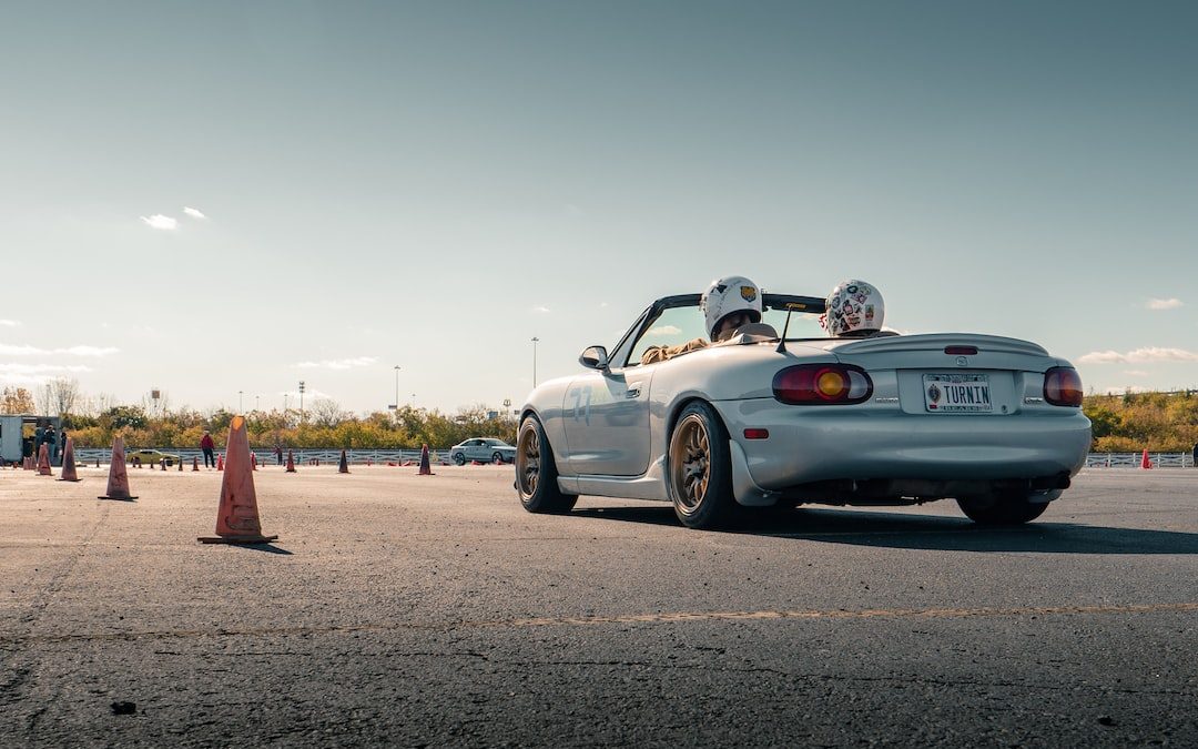 white porsche 911 on road during daytime