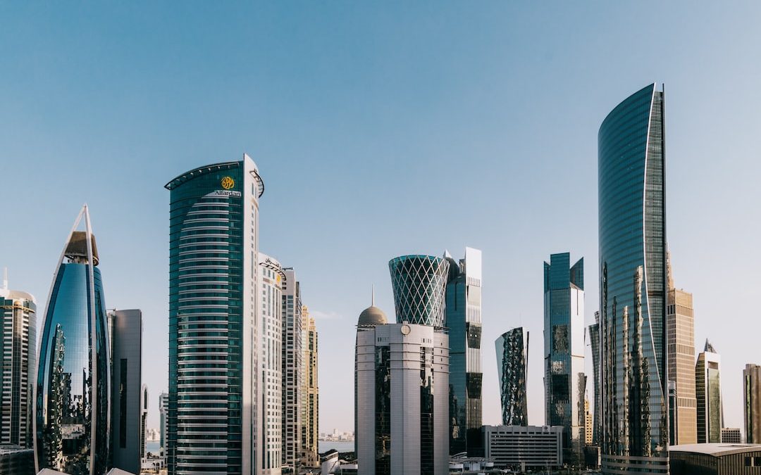 a group of tall buildings in a city