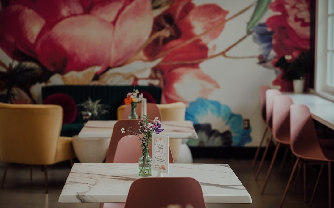 a table with a vase of flowers