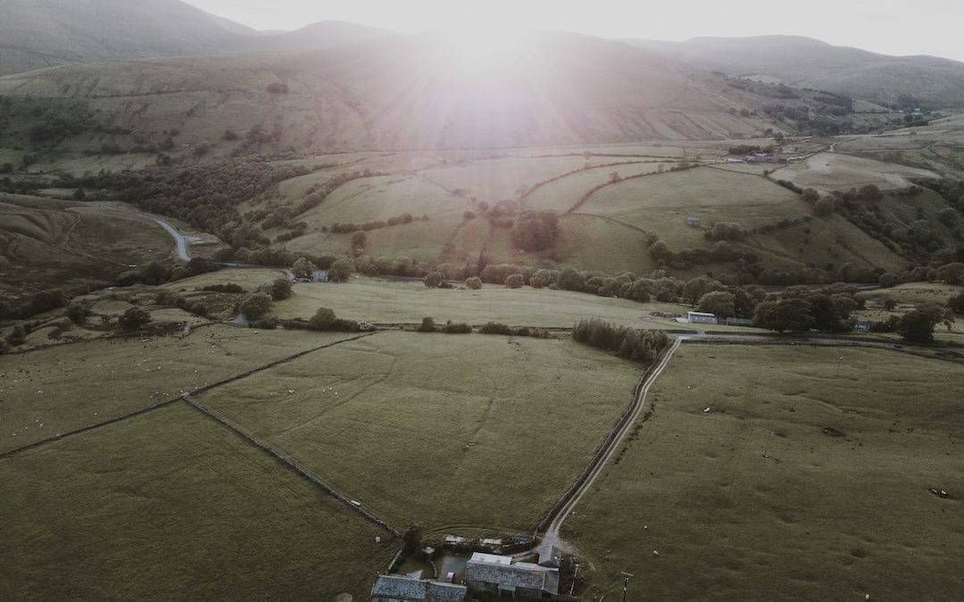 house in the middle of field