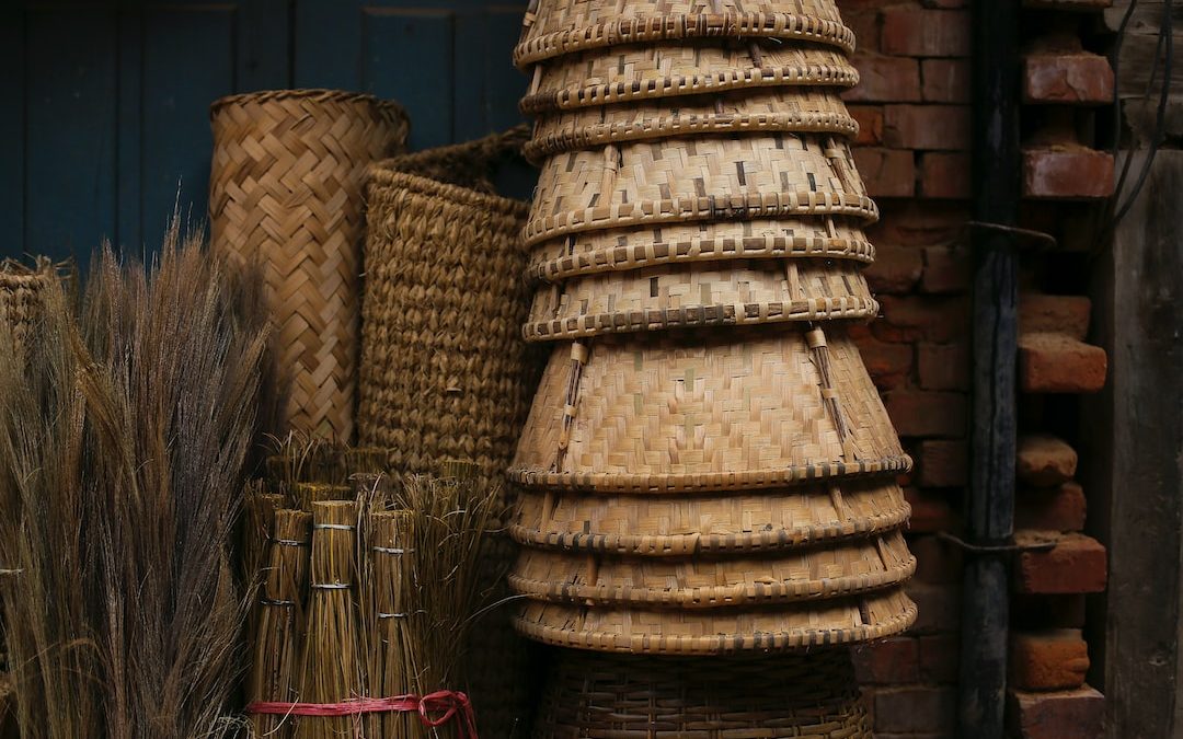 a pile of woven baskets sitting next to each other