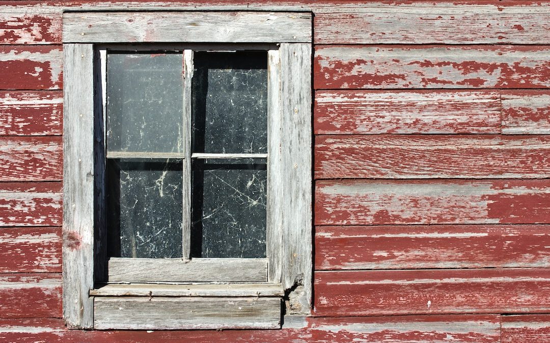 4-panel glass window with gray wooden frame