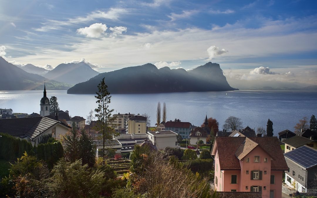 a town with a lake in the background