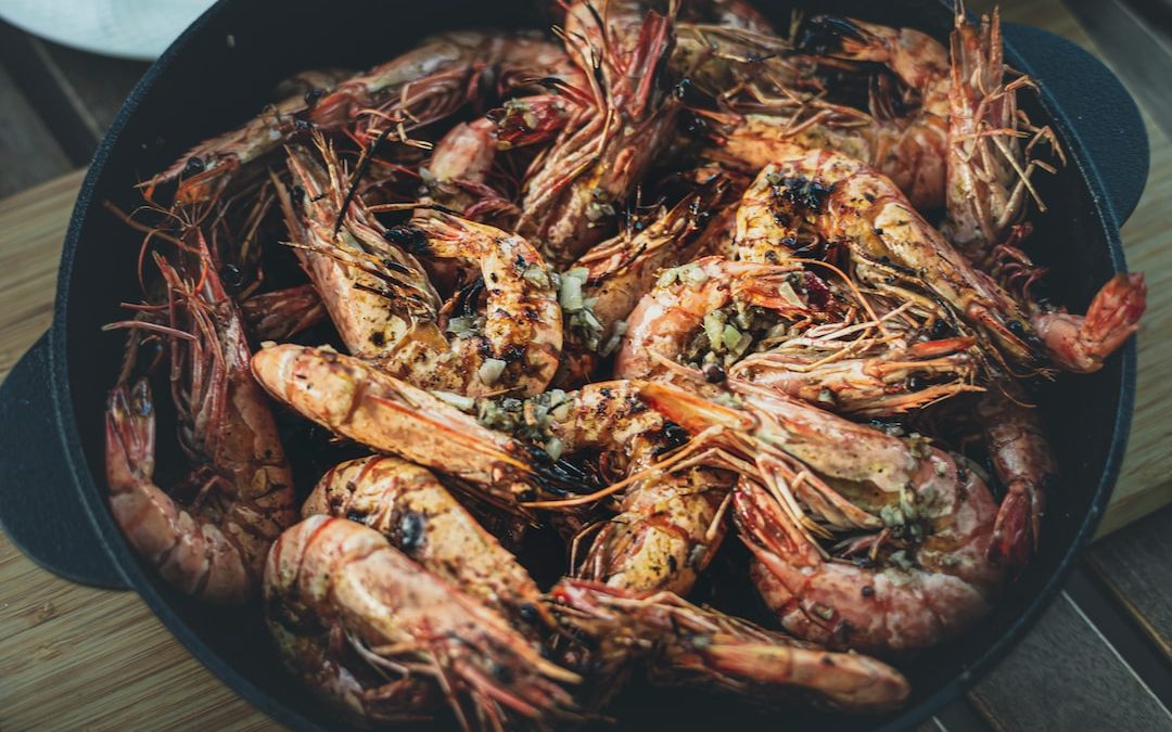 fried shrimps on black round plate