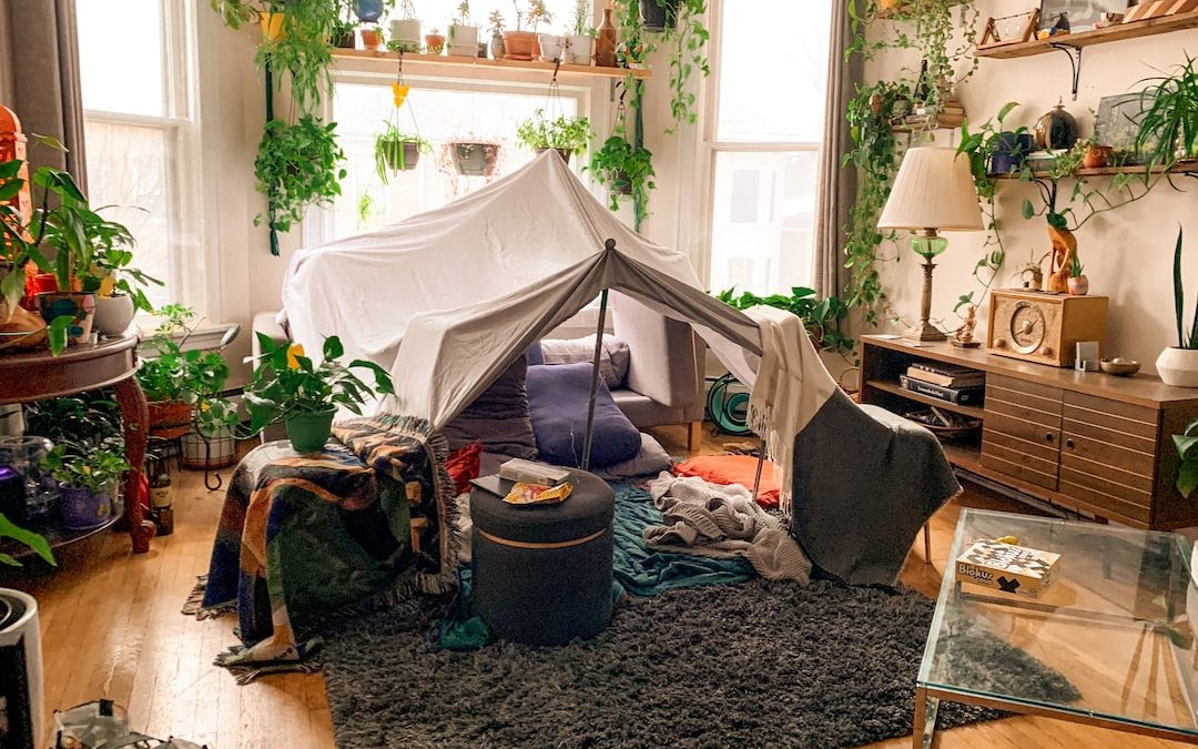 white mosquito net on brown wooden table