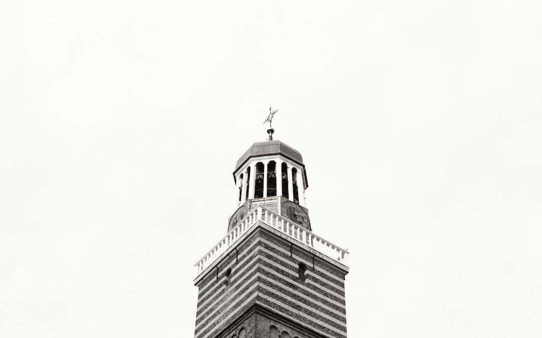 brown concrete building under white sky during daytime