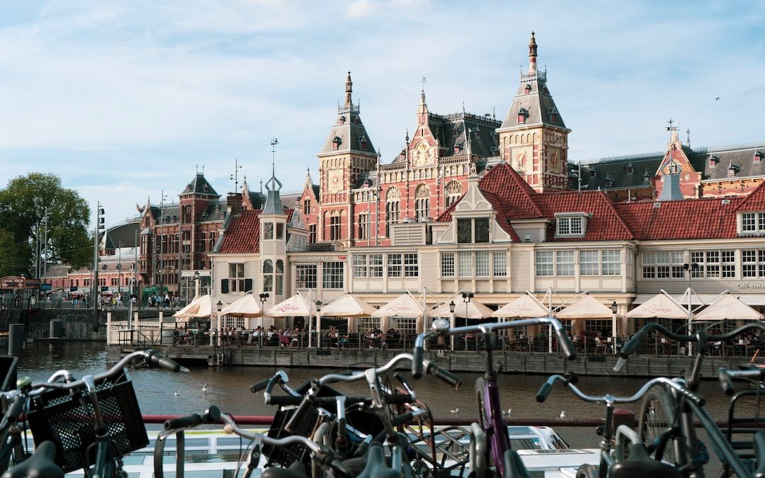 a group of boats parked in front of a building