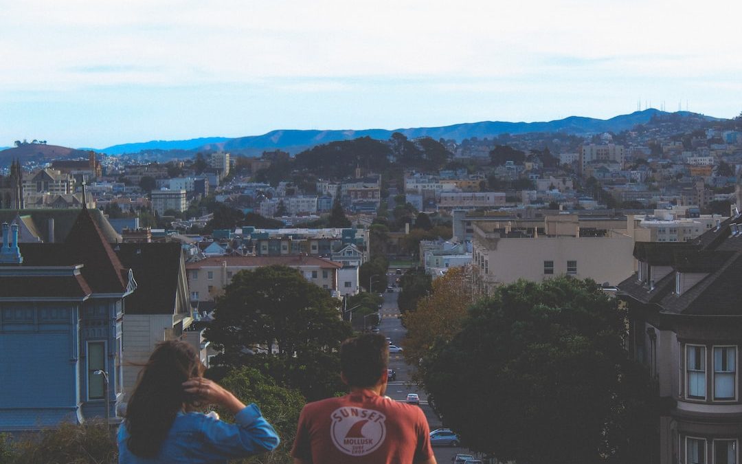 woman and man looking at houses