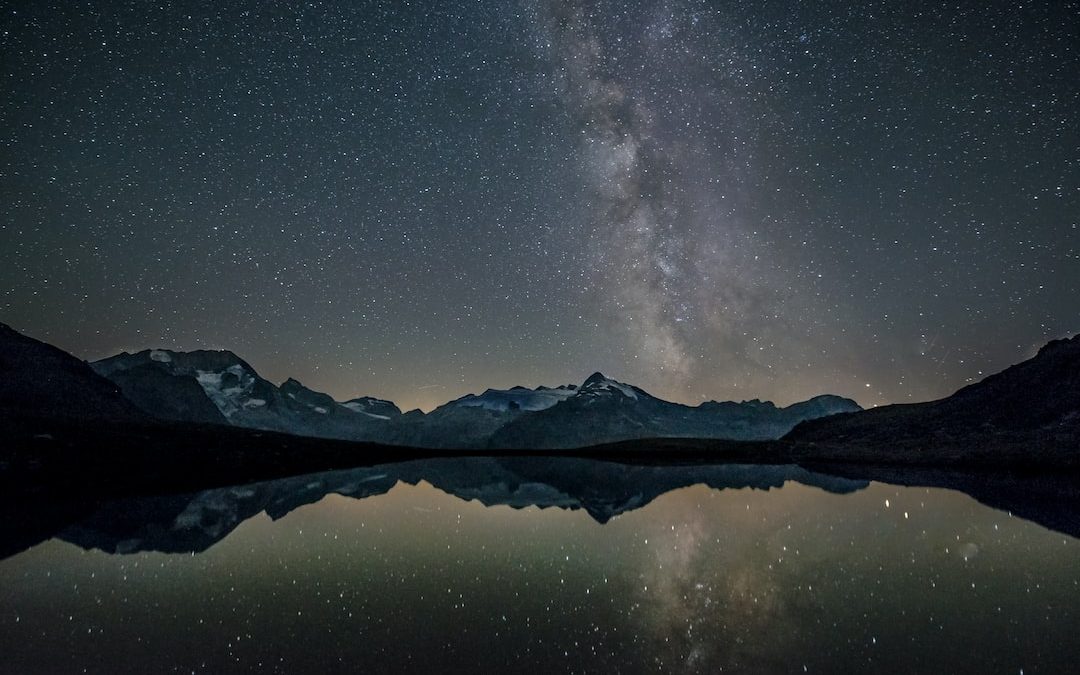 mountain near body of water