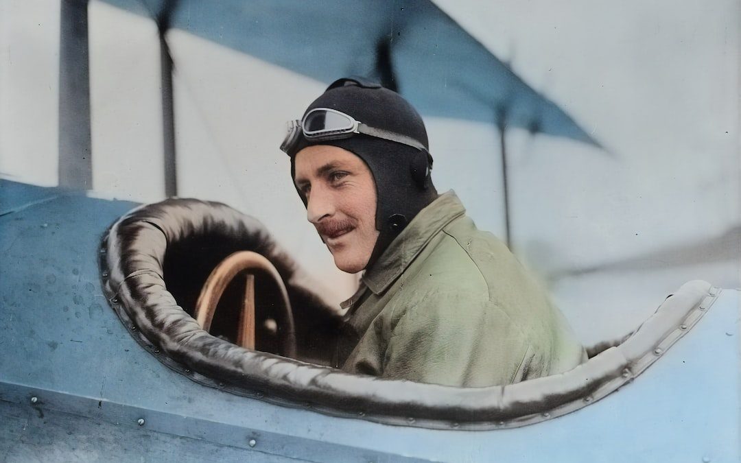 man inside biplane