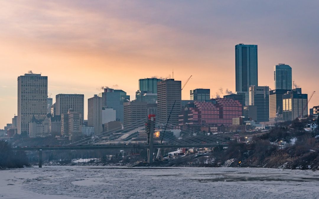 city skyline during sunset with bridge