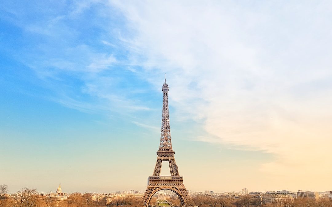 the eiffel tower towering over the city of paris