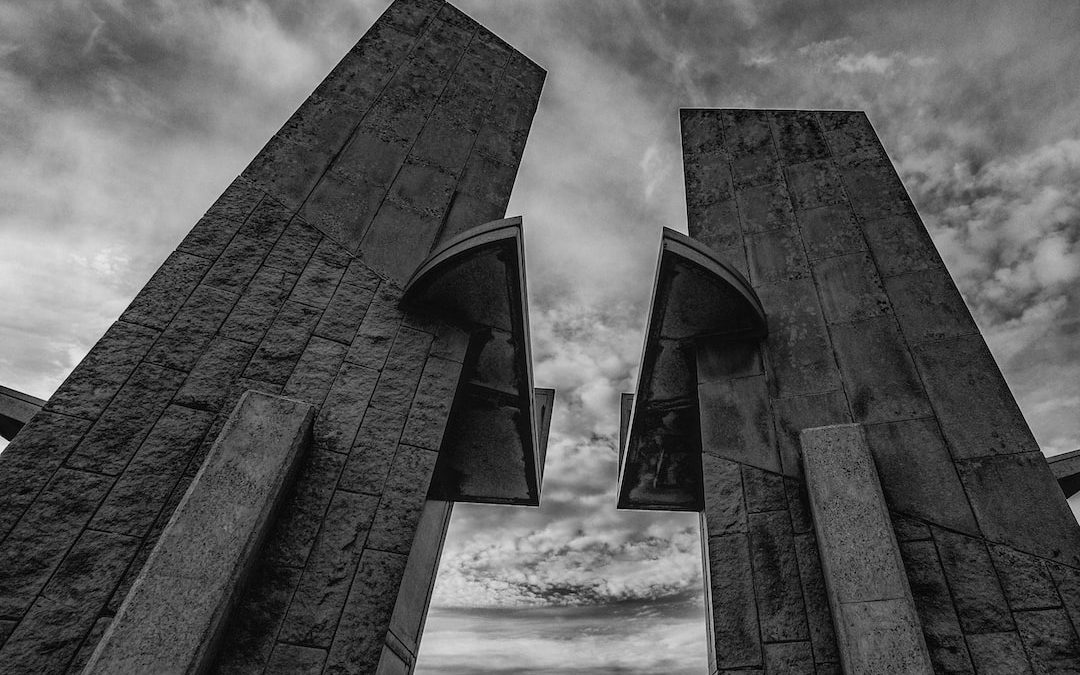 grayscale photo of concrete building