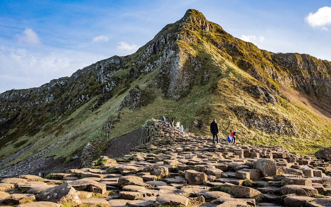 person standing behind mountain