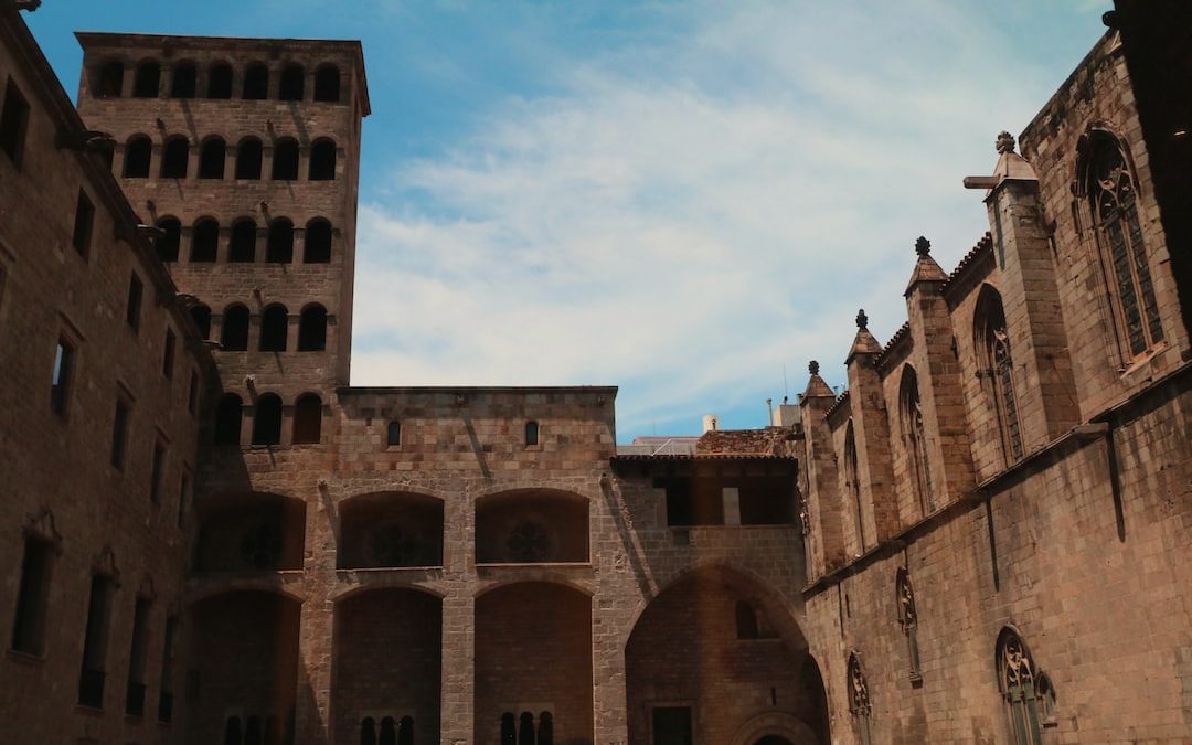 a large stone building with a sky background