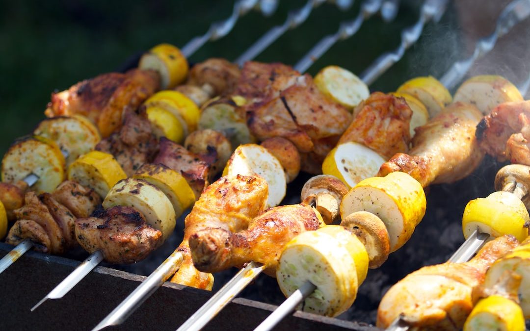 grilled meat on charcoal grill