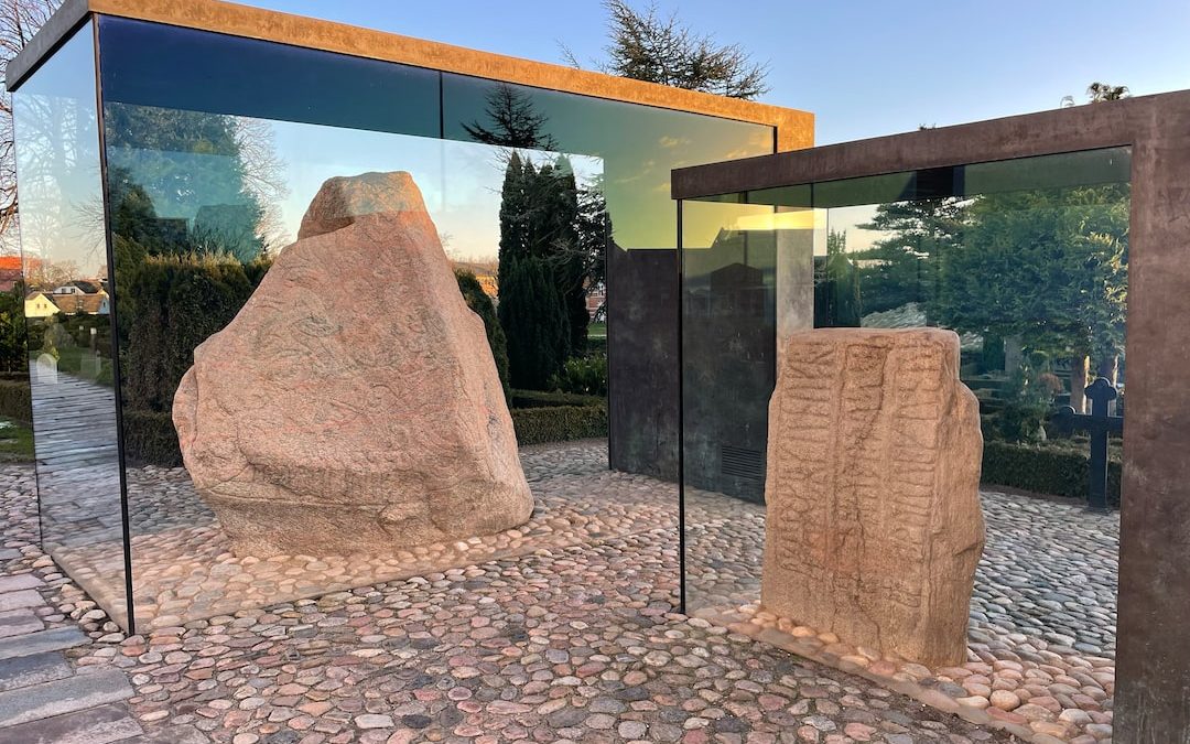 a large rock sculpture outside of a building