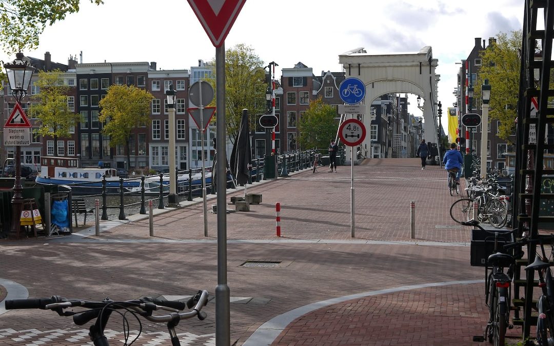 a bicycle parked on the side of a road